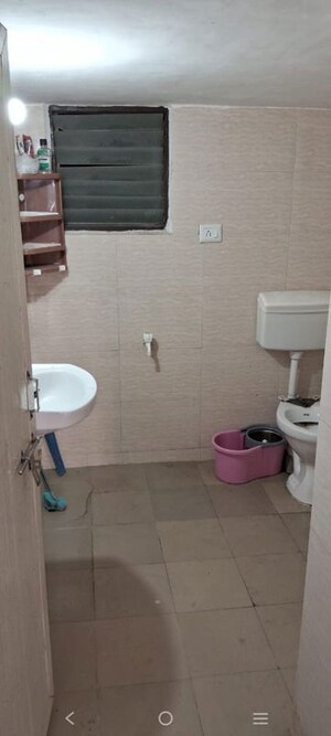 Bathroom in 2 BHK Apartment at MBA Om Krupa, Thaltej – for Rent