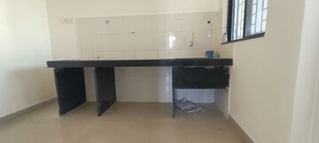 Kitchen in 2 BHK Apartment at Dharmavat Sunder Samruddhi, Dhayari – for Rent