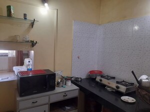 Kitchen in 3 BHK Apartment at Green Valley CHS, Wanwadi – for Rent