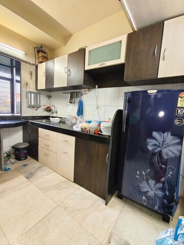 Kitchen in 2 BHK Apartment at Acme Enclave, Malad West – for Rent