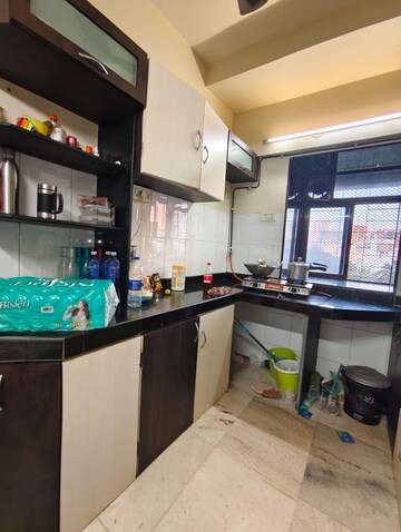 Kitchen in 2 BHK Apartment at Acme Enclave, Malad West – for Rent
