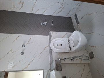 Bathroom in 3 BHK Apartment at Krisumi Waterfall Suites, Sector 36a – for Rent