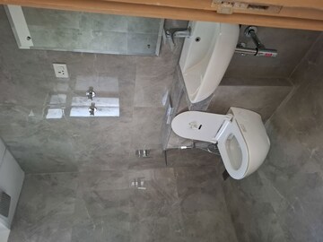 Bathroom in 3 BHK Apartment at Krisumi Waterfall Suites, Sector 36a – for Rent