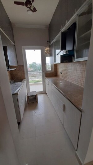 Kitchen in 2.5 BHK Builder Floor at Central Park Cerise Suites, Sohna Sector 33 – for Rent