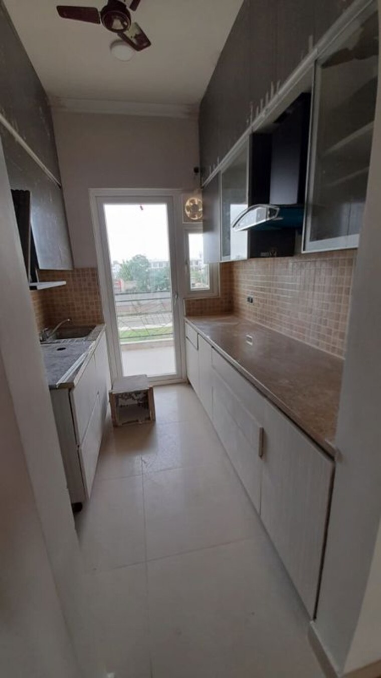 Kitchen, central-park-cerise-suites 2.5 Bedroom 1210 Sq.Ft. Builder Floor In Sohna Sector 33 Gurgaon 9929409