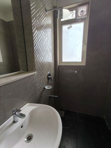Bathroom in 4 BHK Apartment at Omkar Alta Monte, Malad East – for Rent