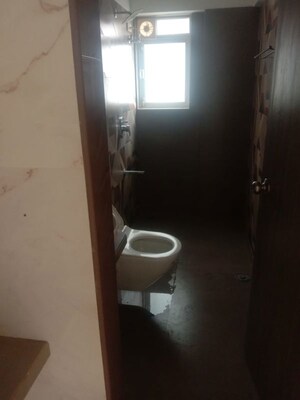Bathroom in 1 BHK Apartment at Nandini CHS, Andheri West – for Sale