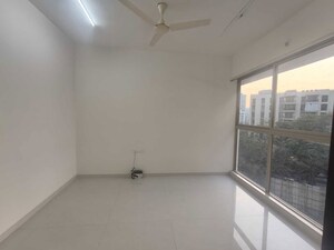 Living Room in 1 BHK Apartment at Lodha Splendora, Ghodbunder Road – for Rent