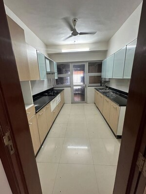 Kitchen in 4 BHK Apartment at DB Realty Orchid Woods, Goregaon East – for Rent