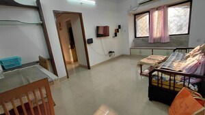 Living Room in 1 BHK Apartment at Satellite Garden, Goregaon East – for Rent