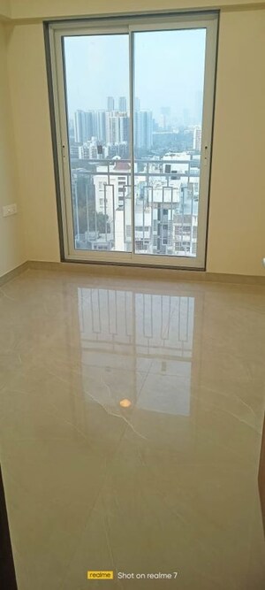 Room in 2 BHK Apartment at Dhoot Sky Residency New Sonali CHSL, Malad West – for Sale