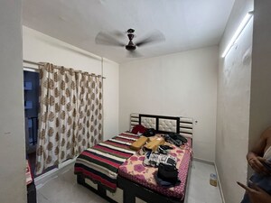 Bedroom in 1.5 BHK Builder Floor at Rajpur Khurd Extension – for Sale