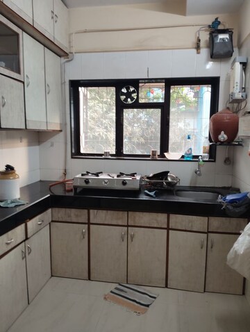Kitchen in 1 BHK Apartment at Santoor CHS, Goregaon East – for Rent