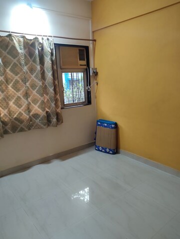 Room in 1 BHK Apartment at Santoor CHS, Goregaon East – for Rent