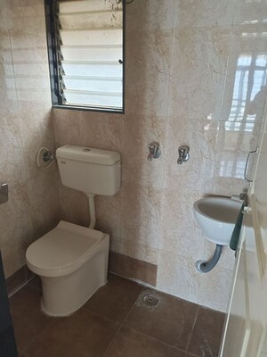 Bathroom in 1.5 BHK Apartment at Hubtown Greenwoods, Vartak Nagar – for Sale