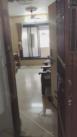 Living Room in 1 BHK Apartment at Kopar Khairane – for Rent