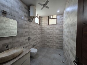 Bathroom in 3 BHK Apartment at Chattarpur – for Rent