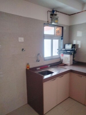 Kitchen in 2 BHK Apartment at Je And Vee Om Trimurti, Malad East – for Sale