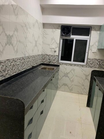 Kitchen in 1 BHK Apartment at DGS Sheetal Tapovan, Malad East – for Rent