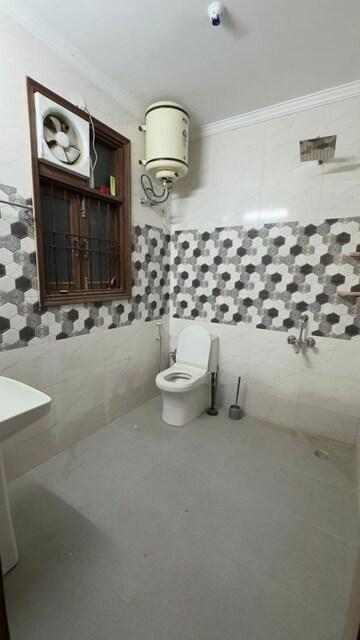 Bathroom in 3 BHK Builder Floor at Chattarpur – for Rent
