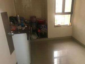 Room in 2.5 BHK Apartment at Rutu Estate, Brahmand – for Sale