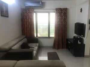 Living Room in 2.5 BHK Apartment at Rutu Estate, Brahmand – for Sale