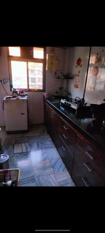 Kitchen in 2 BHK Apartment at Savli CHS Borivalli, Borivali West – for Sale