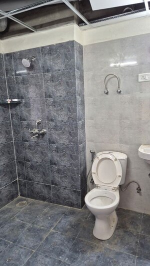Bathroom in 2 BHK Apartment at Amrapali Heartbeat City, Sector 107 – for Rent