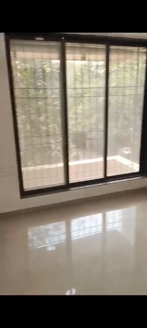 Room in 1.5 BHK Apartment at Shree Sai D N Nagar Shivneri CHS Ltd, Andheri West – for Sale