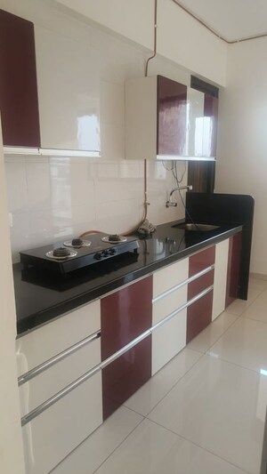 Kitchen in 2 BHK Apartment at Paranjape Broadway, Wakad – for Rent
