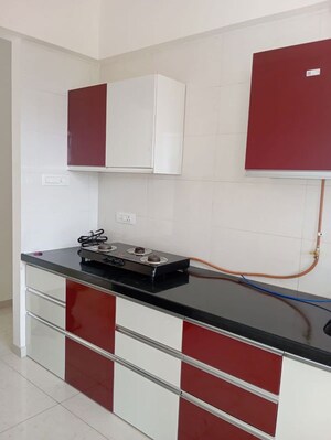 Kitchen in 2 BHK Apartment at Paranjape Broadway, Wakad – for Rent