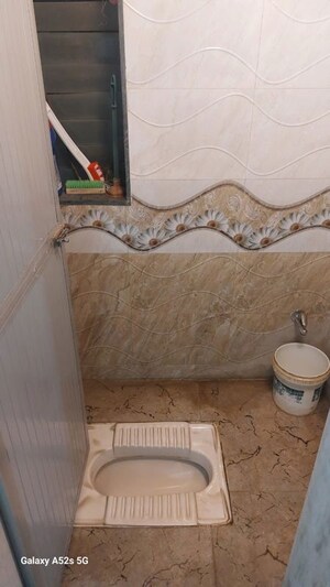 Bathroom in 2 BHK Apartment at Gokuldham Complex, Goregaon East – for Rent