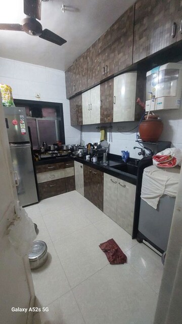 Kitchen in 2 BHK Apartment at Gokuldham Complex, Goregaon East – for Rent