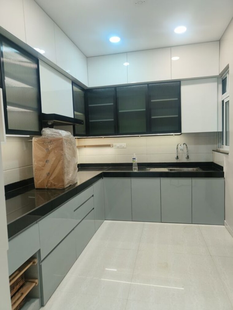 Kitchen, bhandari-7-plumeria-drive 2 Bedroom 877 Sq.Ft. Apartment In Tathawade Pune 9931243