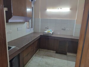 Kitchen in 1.5 BHK Apartment at Defence Colony – for Rent