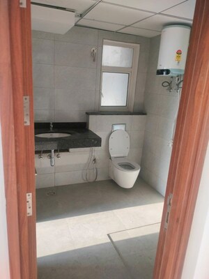Bathroom in 2 BHK Apartment at Sector 27 Yamuna Expressway – for Rent