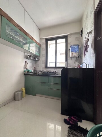 Kitchen in 2 BHK Apartment at Narol Road – for Sale