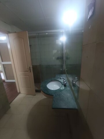 Bathroom in 3.5 BHK Apartment at Orchid Petals, Sector 49 – for Rent