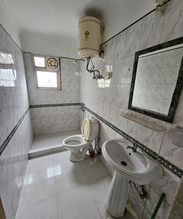 Bathroom in 1 BHK Builder Floor at East Of Kailash – for Rent
