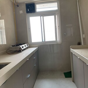 Kitchen in 3 BHK Apartment at Shraddha Elite, Poisar – for Rent