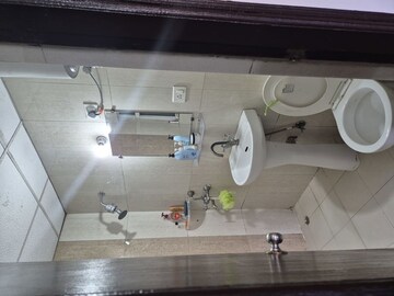 Bathroom in 2 BHK Apartment at Antriksh Golf View, Sector 78 – for Rent