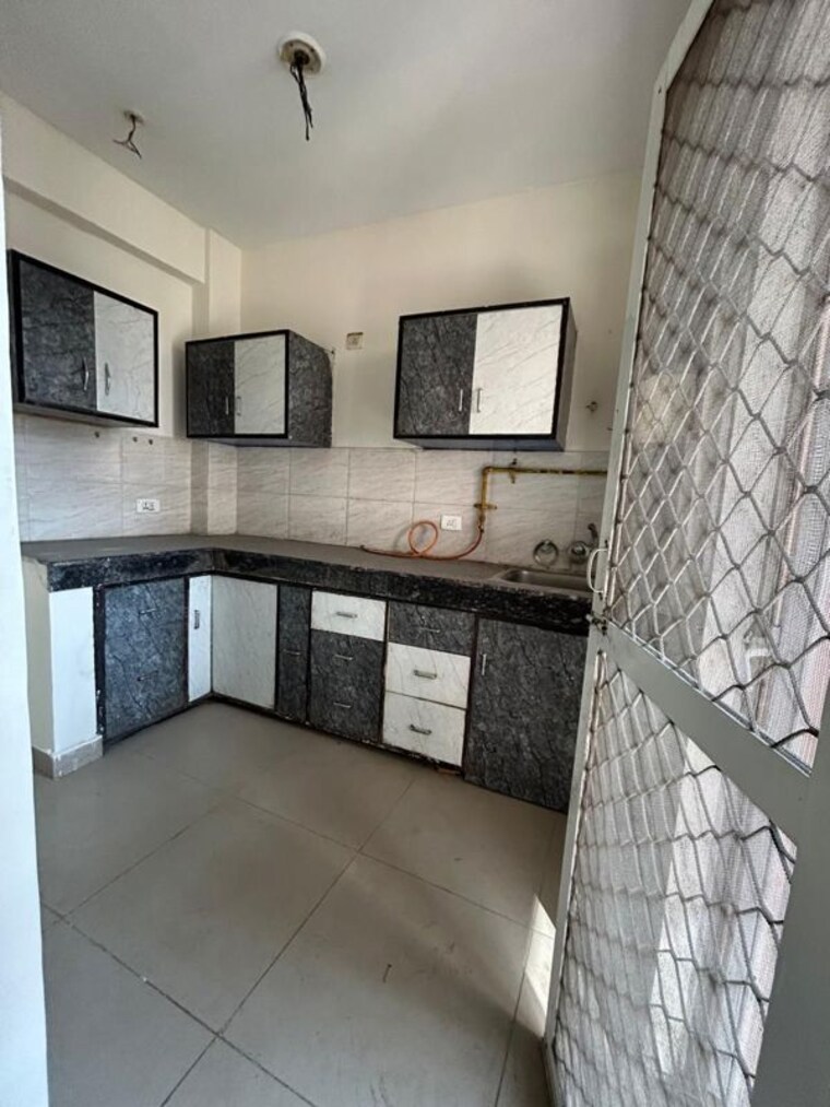 Kitchen, assotech-the-nest 2.5 Bedroom 1285 Sq.Ft. Apartment In Sain Vihar Ghaziabad 9931376