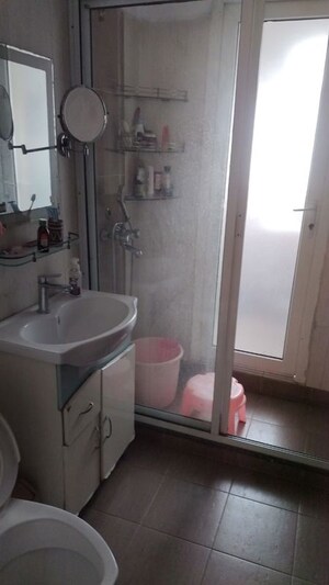 Bathroom in 3.5 BHK Apartment at Mahagun Maestro, Sector 50 – for Sale