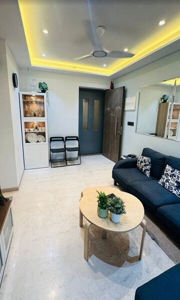 Living Room in 2 BHK Apartment at Runwal Eirene, Balkum Pada – for Rent