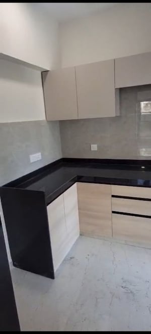 Kitchen in 2 BHK Apartment at Pratham ARC Aura, Andheri West – for Rent