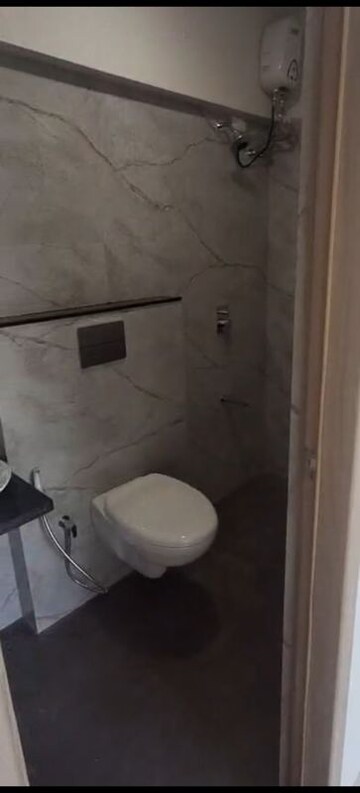 Bathroom in 1 BHK Apartment at JP Eminence, Andheri West – for Rent