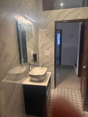 Bathroom in 3 BHK Apartment at East Of Kailash – for Rent