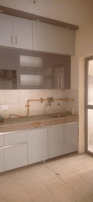 Kitchen in 2.5 BHK Apartment at Amrapali Empire, Sain Vihar – for Sale