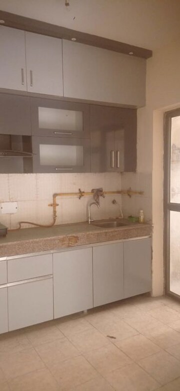 Kitchen in 2.5 BHK Apartment at Amrapali Empire, Sain Vihar – for Sale