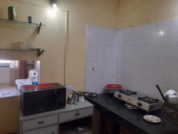 Kitchen, amba-vatika 2 Bedroom 800 Sq.Ft. Apartment In Nibm Pune 9929663